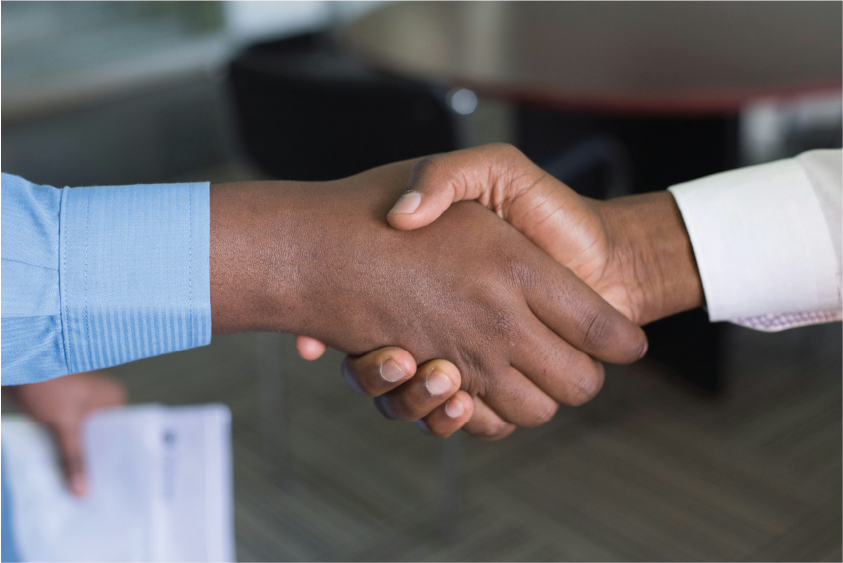 Business partners shaking hands